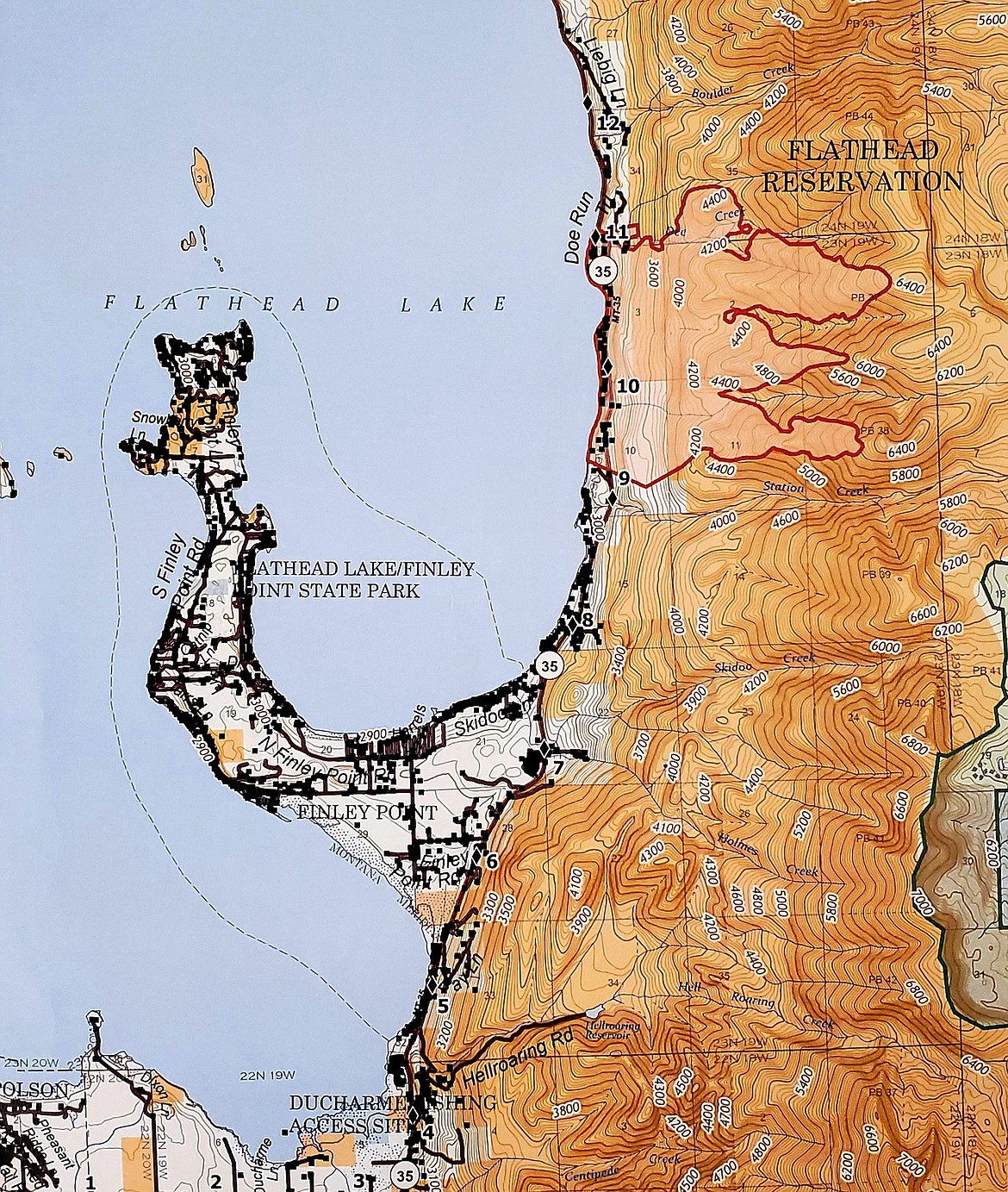 A map provided by the Northern Rockies Incident Management Team 4 shows the boundaries of the Boulder 2700 Fire as of Thursday, Aug. 5, 2021. The fire is outlined in red on the east shore of Flathead Lake, just north of Finley Point.