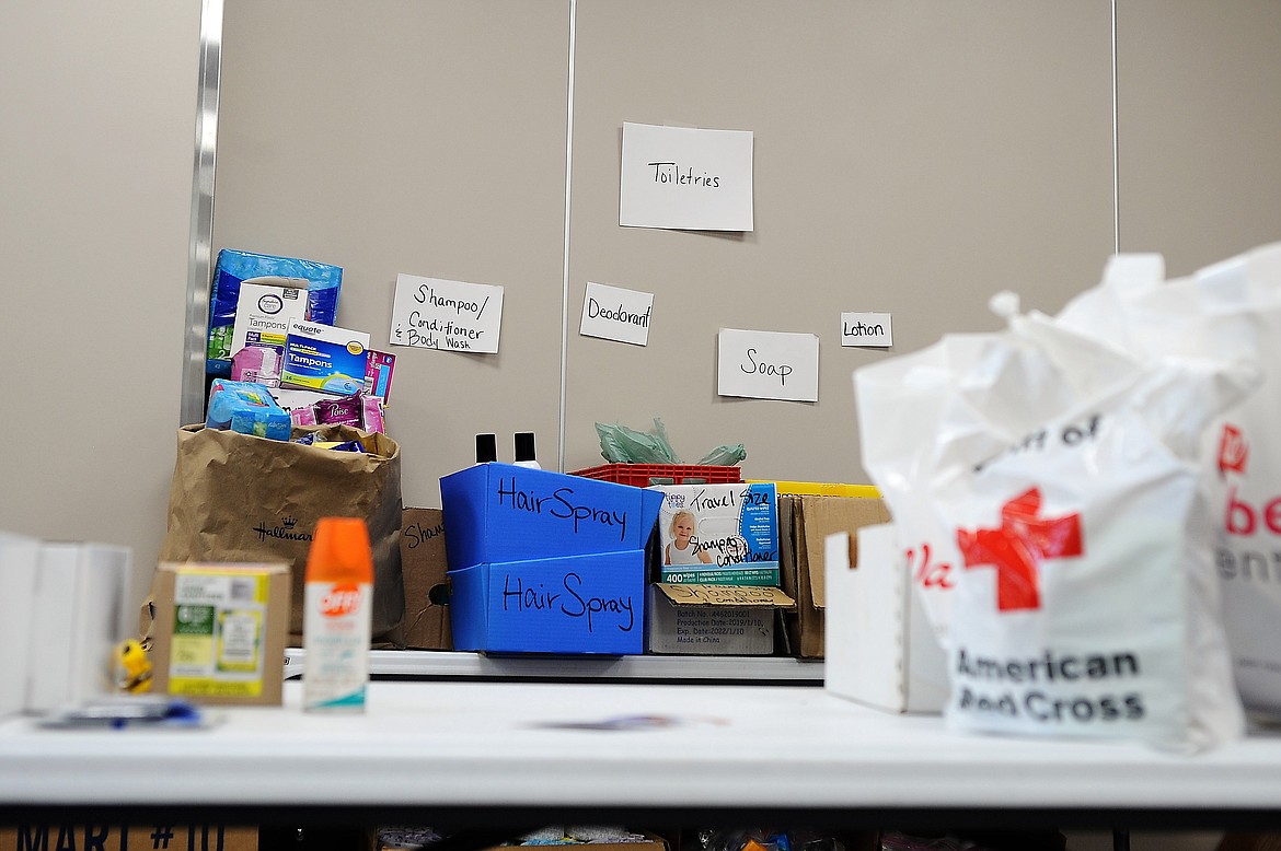 Shelves are stocked with toiletries for people displaced by the Boulder 2700 Fire at a Red Cross shelter at Linderman Elementary School in Polson on Thursday, Aug. 5, 2021.