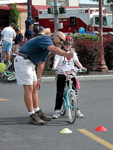 A bicyclist prepares for the obstacle course in the 2006 Bike Rodeo.