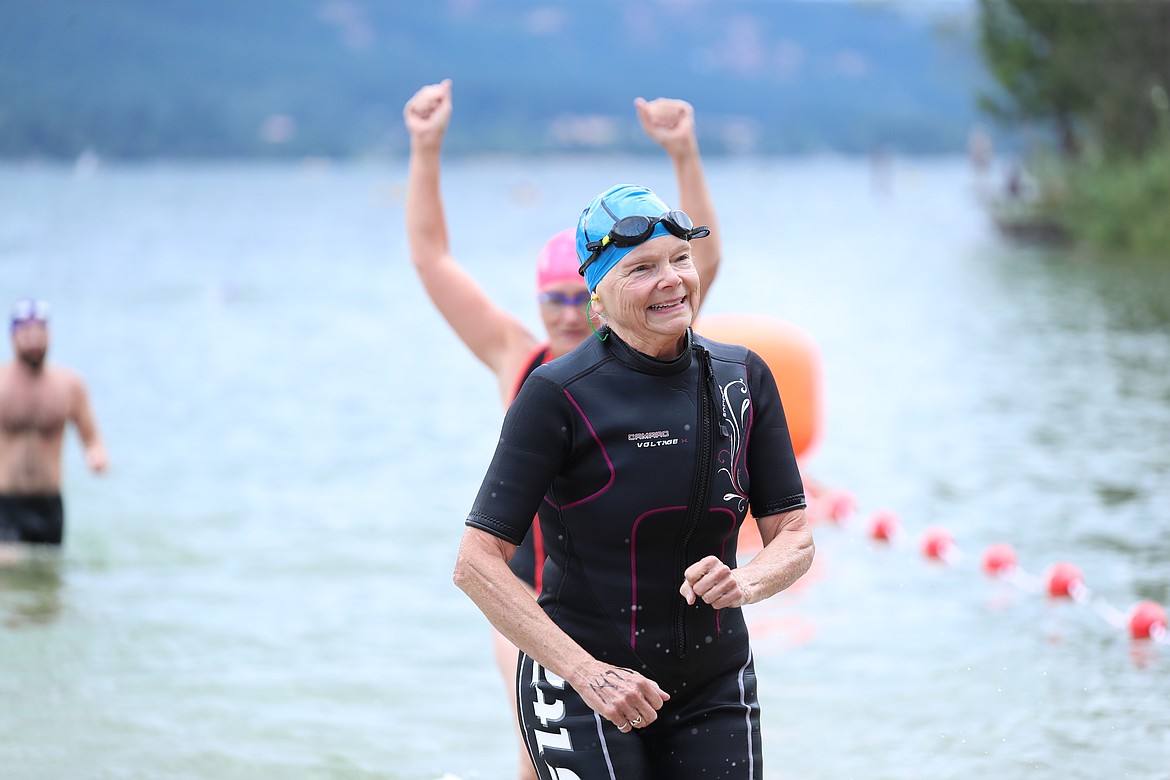 Jean Fisher crosses the finish line on Saturday.