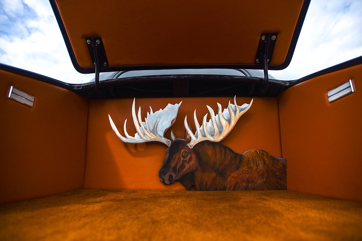 A moose hides out in the trunk of Bigfork resident Bill Smith's 1937 Chevrolet Business Coupe at the Evergreen Show 'N Shine at Conlin's Furniture on Saturday, Aug. 7. (Casey Kreider/Daily Inter Lake)