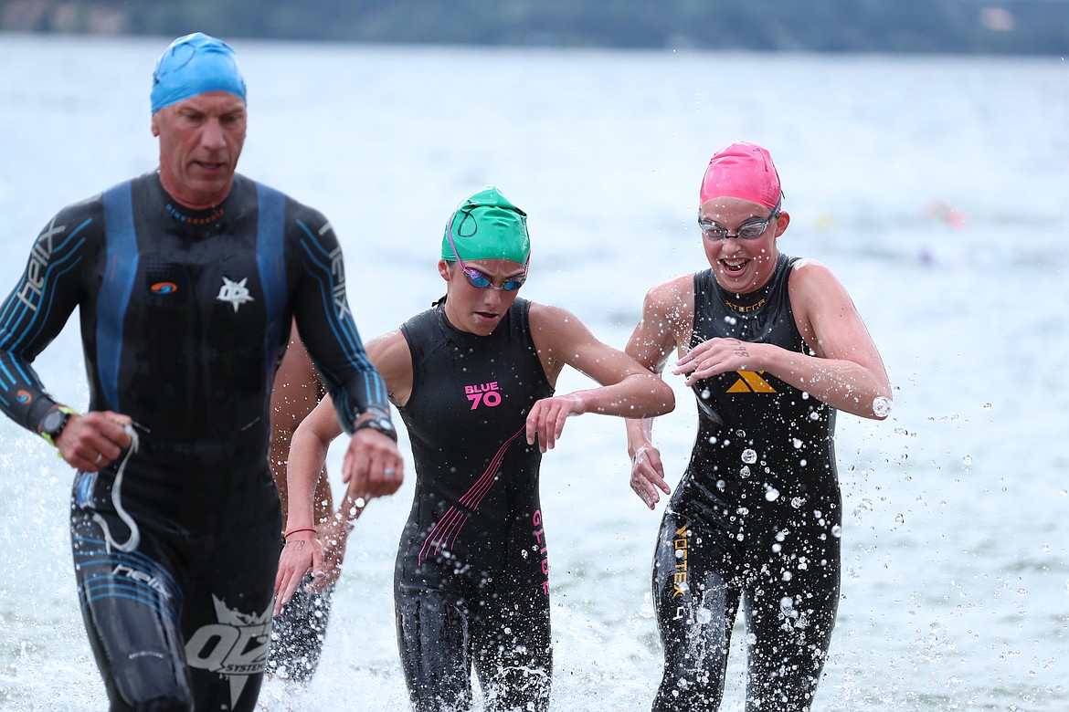 A group of swimmers battle for position as they near the end of the Long Bridge Swim on Saturday.