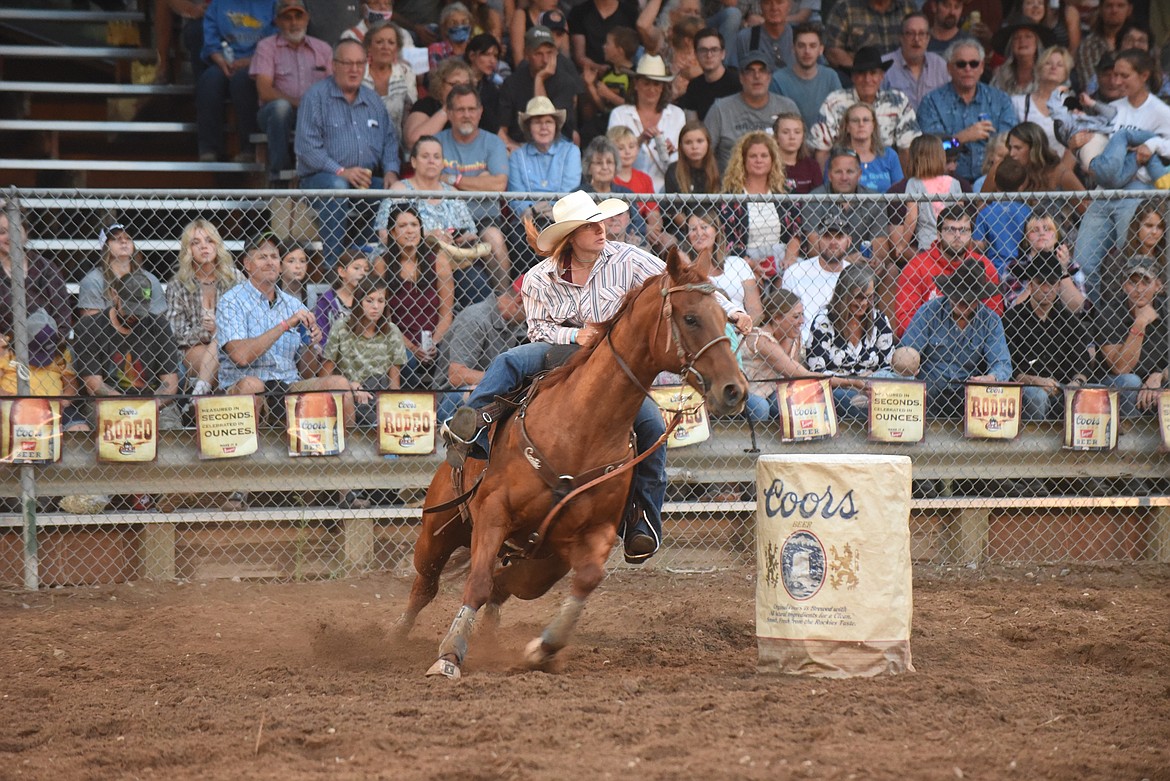 Red Lodge’s Mckenna Schroeder competed in the barrel racing event during the barrel racing event last Friday at the Mineral County Fair Superior Lions Club “Go for The Gold” Rodeo. (Scott Shindledecker/Mineral Independent)