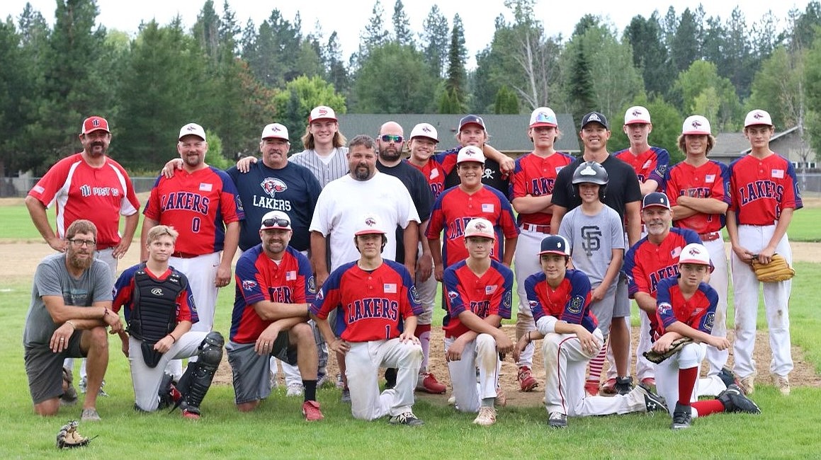 The 16U North Idaho Lakers and coaches, dads and alumni of the team pose for a photo during Saturday's festivities.