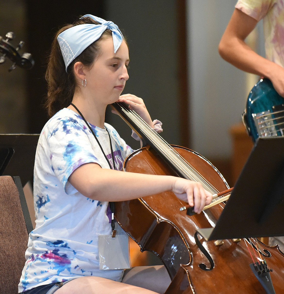 Hailey Simon plays the cello Friday during the Camp Festival Amadeus concert at Christ Lutheran Church. (Heidi Desch/Whitefish Pilot)