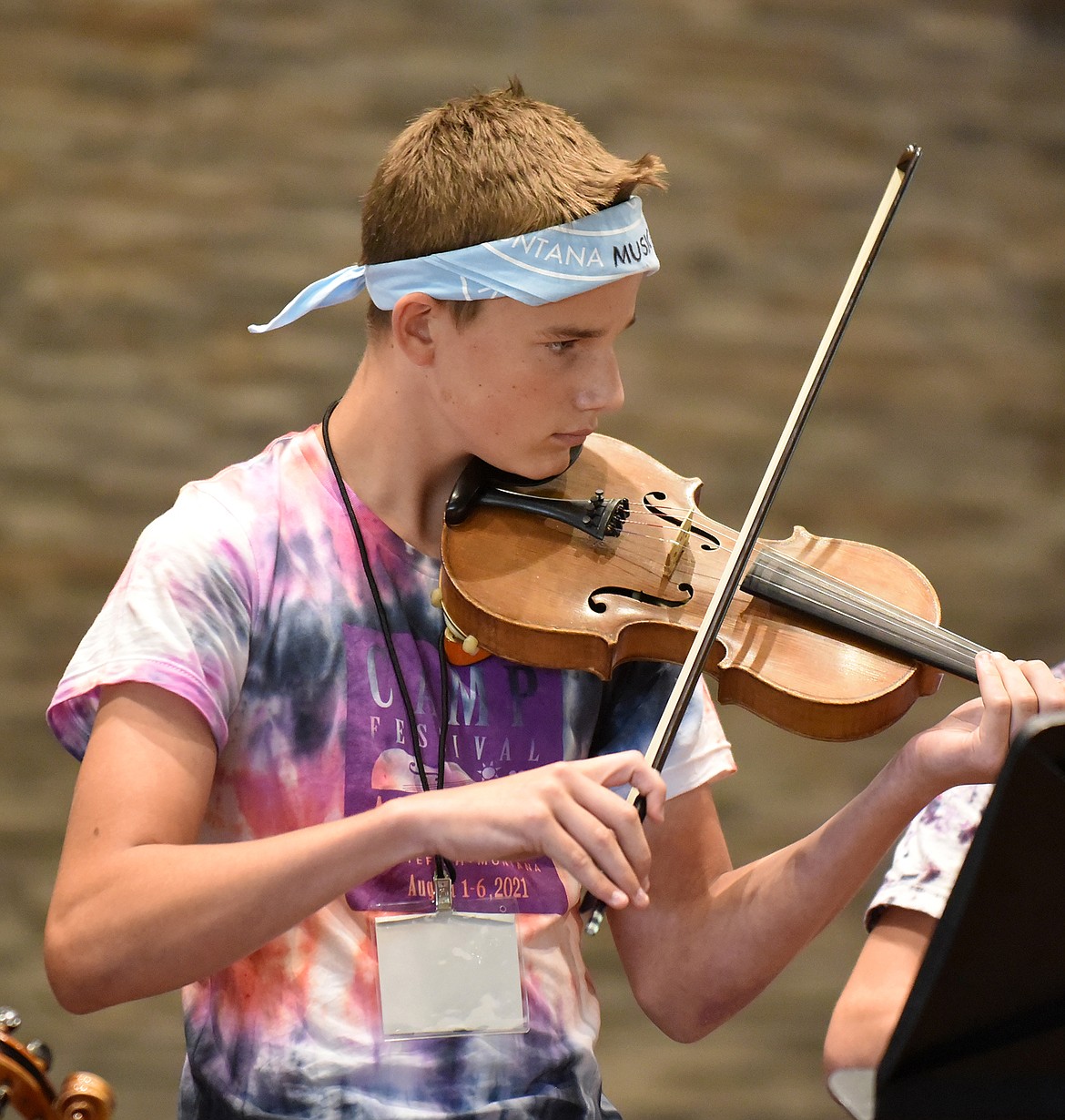 Carson Krack play the violin Friday during the Camp Festival Amadeus concert at Christ Lutheran Church. (Heidi Desch/Whitefish Pilot)