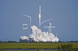 Space station supplies launched with a pizza delivery for 7