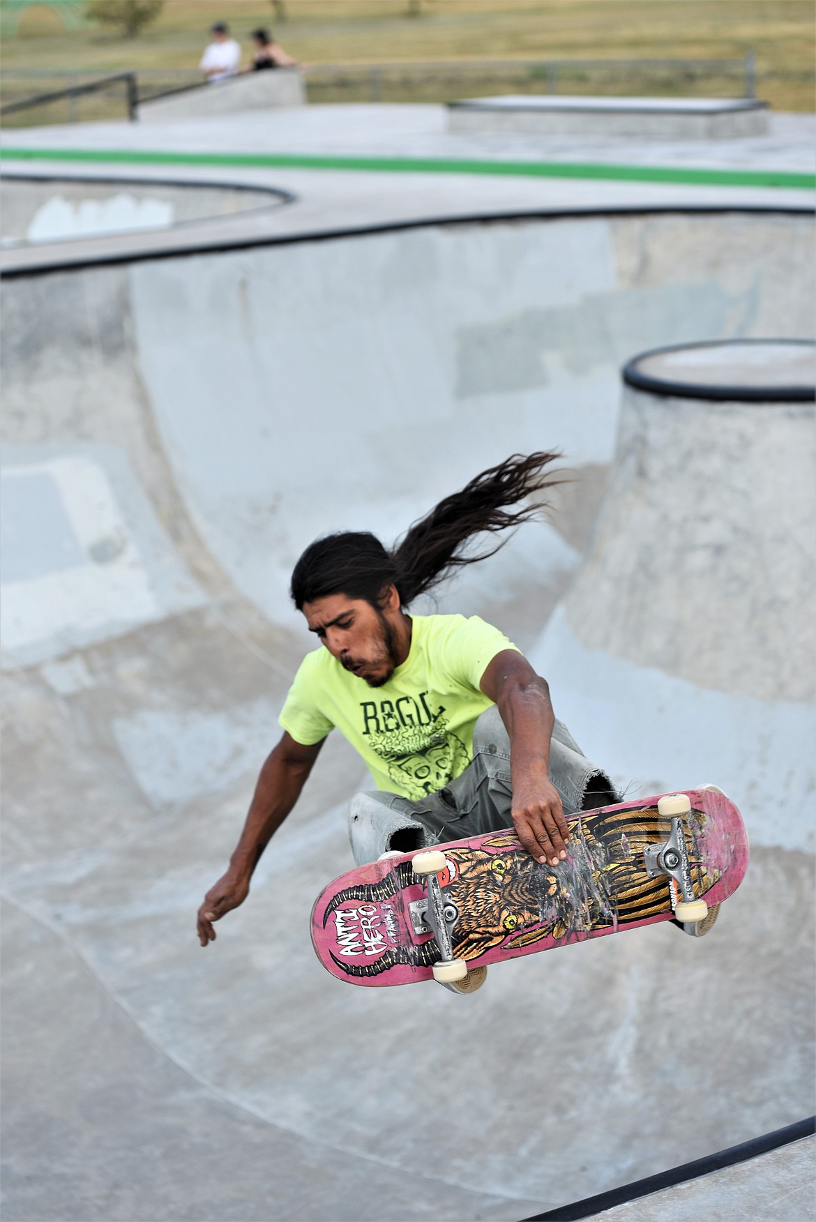 A skater catches some air off the wall of one of the park's bowls. (Scot Heisel/Lake County Leader)