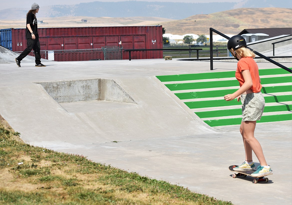 A novice skater takes her first run at Seventh Avenue Skate Park. (Scot Heisel/Lake County Leader)