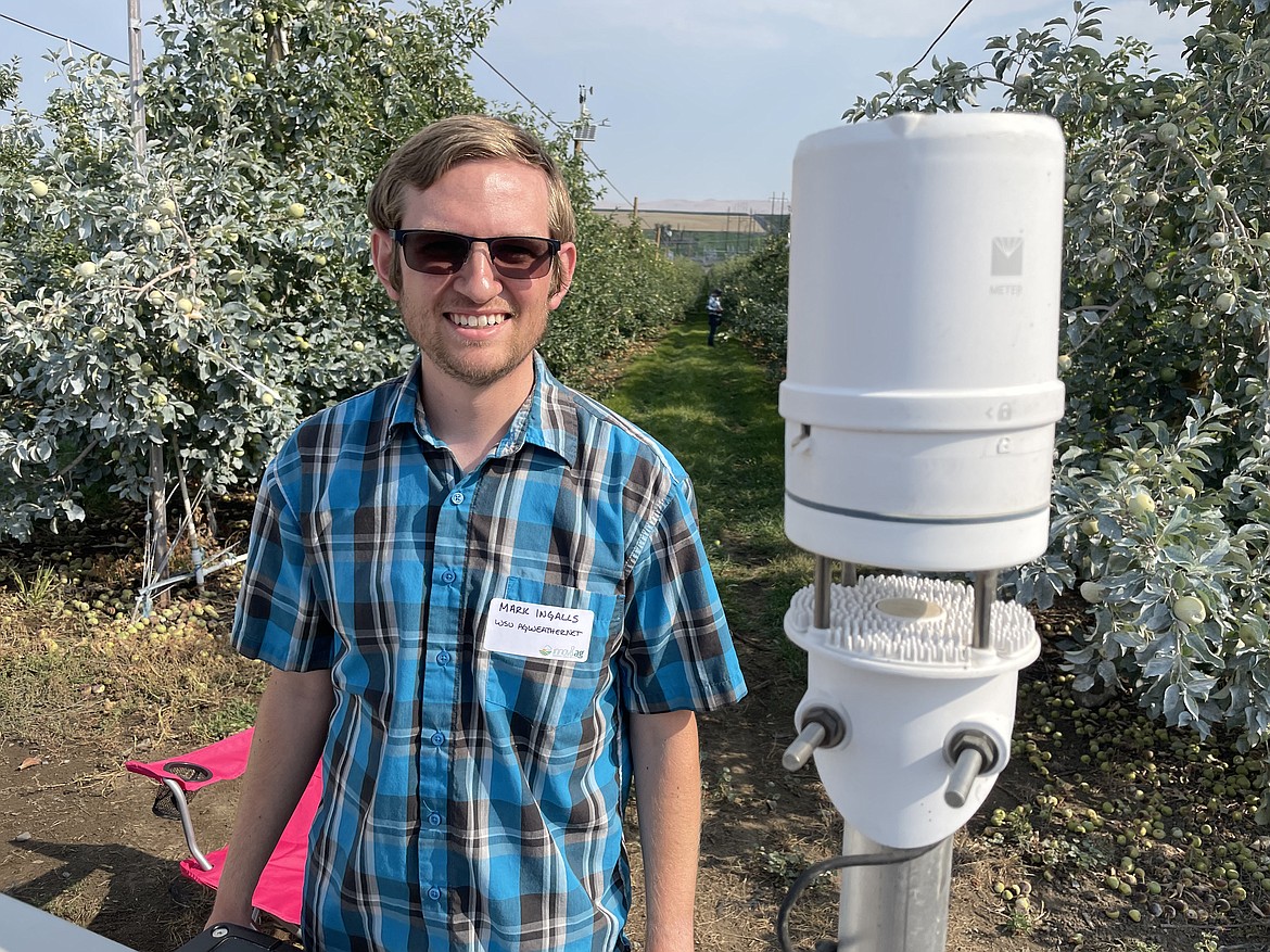 Mark Ingalls with WSU's AgWeatherNet and one of system's simple weather monitors. Ingalls said AgWeatherNet has around 50 of these stations across the region, including in parts of Oregon and Idaho.