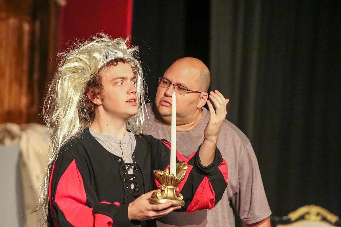 Left to right, Miles Plagerman and Chris Longstreet run through a rehearsal on stage Aug. 5 at Masquers Theater in Soap Lake ahead of the premiere of “Shakespeare Ate My Brain” tonight.