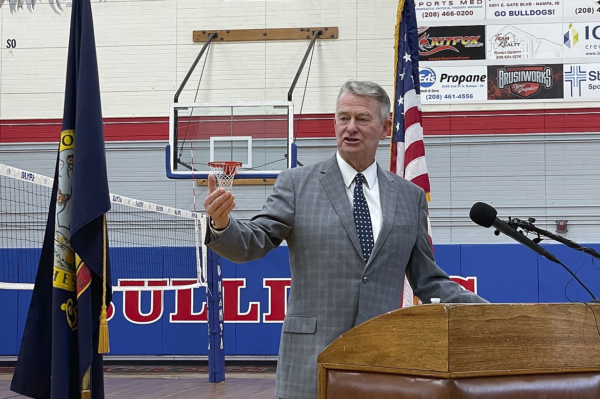 Idaho Gov. Brad Little urges people to get vaccinated against the coronavirus during a visit to Nampa High School in Nampa Idaho, Thursday, Aug. 12, 2021. Little also announced he is directing $30 million to expand COVID-19 testing in K-12 schools.