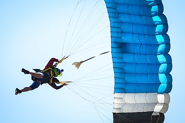 A skydiver swoops in for a landing at the 2021 Skydive Lost Prairie Boogie at Meadow Peak Skydiving near Marion on Thursday, Aug. 12, 2021. (Casey Kreider/Daily Inter Lake)