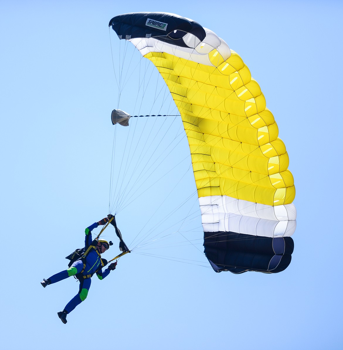 A skydiver descends over the 2021 Skydive Lost Prairie Boogie at Meadow Peak Skydiving near Marion on Thursday, Aug. 12, 2021. (Casey Kreider/Daily Inter Lake)