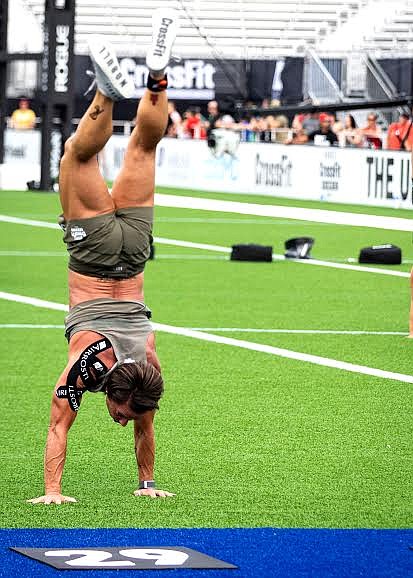 Courtesy photo
Coeur d'Alene's Tia Vesser performs a walking handstand during the 2021 NoBull CrossFit Games in Madison, Wis.