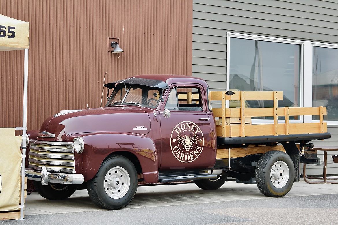 Honey Gardens employees took this vintage ’52 Chevy truck on tour with them across 10 western U.S. states to spread awareness about beekeeping and pass out samples of honey and wellness drinks. HANNAH NEFF/Press