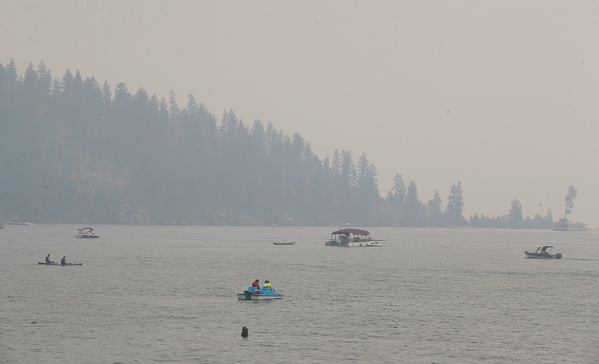 A haze of smoke settles over Tubbs Hill and Lake Coeur d'Alene on Friday afternoon.