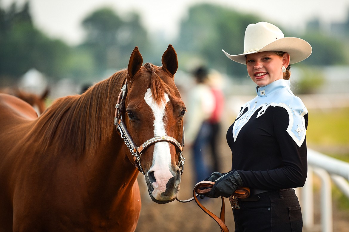 Quindy Cronley with her horse Luke before the start of senior level Showmanship at the 4-H Horse Show at the Northwest Montana Fair on Saturday, Aug. 14. (Casey Kreider/Daily Inter Lake)