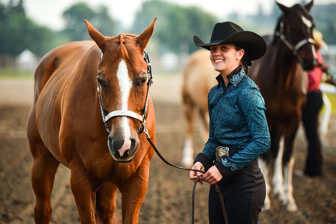 Anna Tretter with her horse Bugsy before the start of senior level Showmanship at the 4-H Horse Show at the Northwest Montana Fair on Saturday, Aug. 14. (Casey Kreider/Daily Inter Lake)