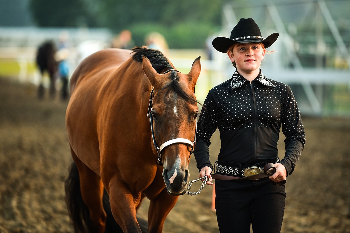 Mia Guffin leads her horse Ivy through the pattern during junior level Showmanship at the 4-H Horse Show at the Northwest Montana Fair on Saturday, Aug. 14. (Casey Kreider/Daily Inter Lake)