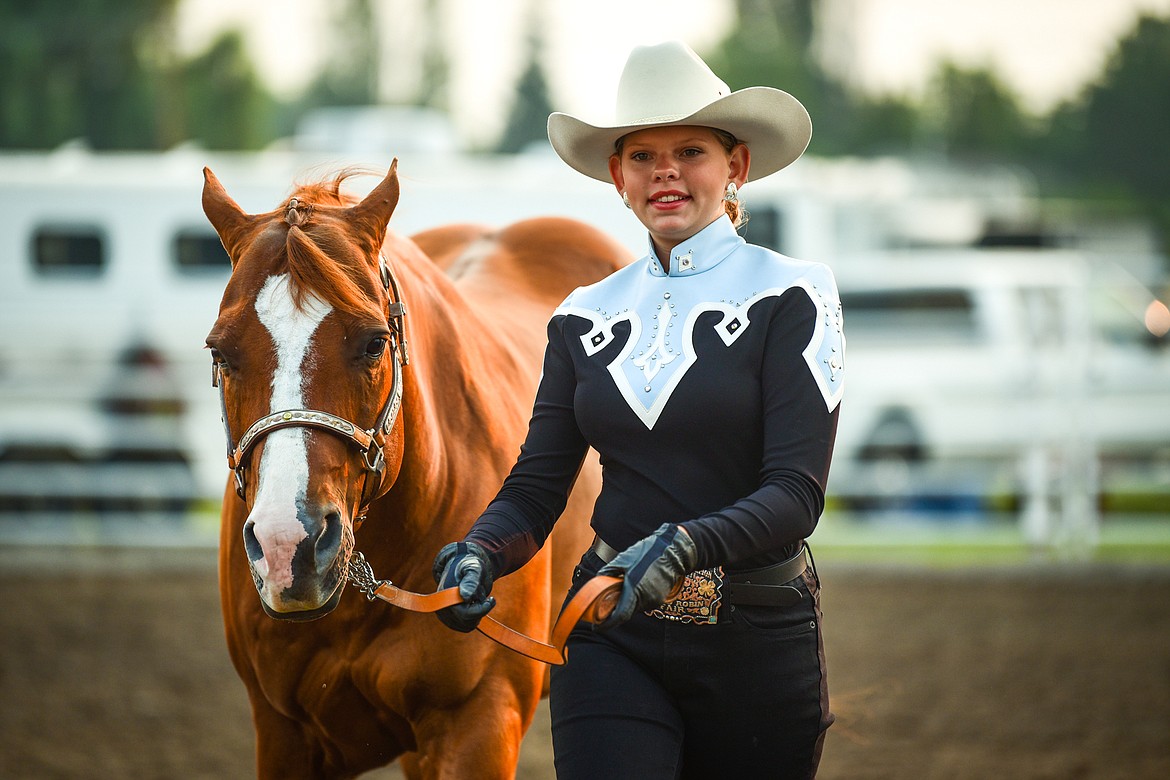 Quindy Cronley leads her horse Luke through the pattern during senior level Showmanship at the 4-H Horse Show at the Northwest Montana Fair on Saturday, Aug. 14. (Casey Kreider/Daily Inter Lake)
