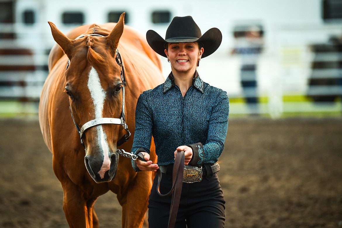 Anna Tretter leads her horse Bugsy through the pattern during senior level Showmanship at the 4-H Horse Show at the Northwest Montana Fair on Saturday, Aug. 14. (Casey Kreider/Daily Inter Lake)
