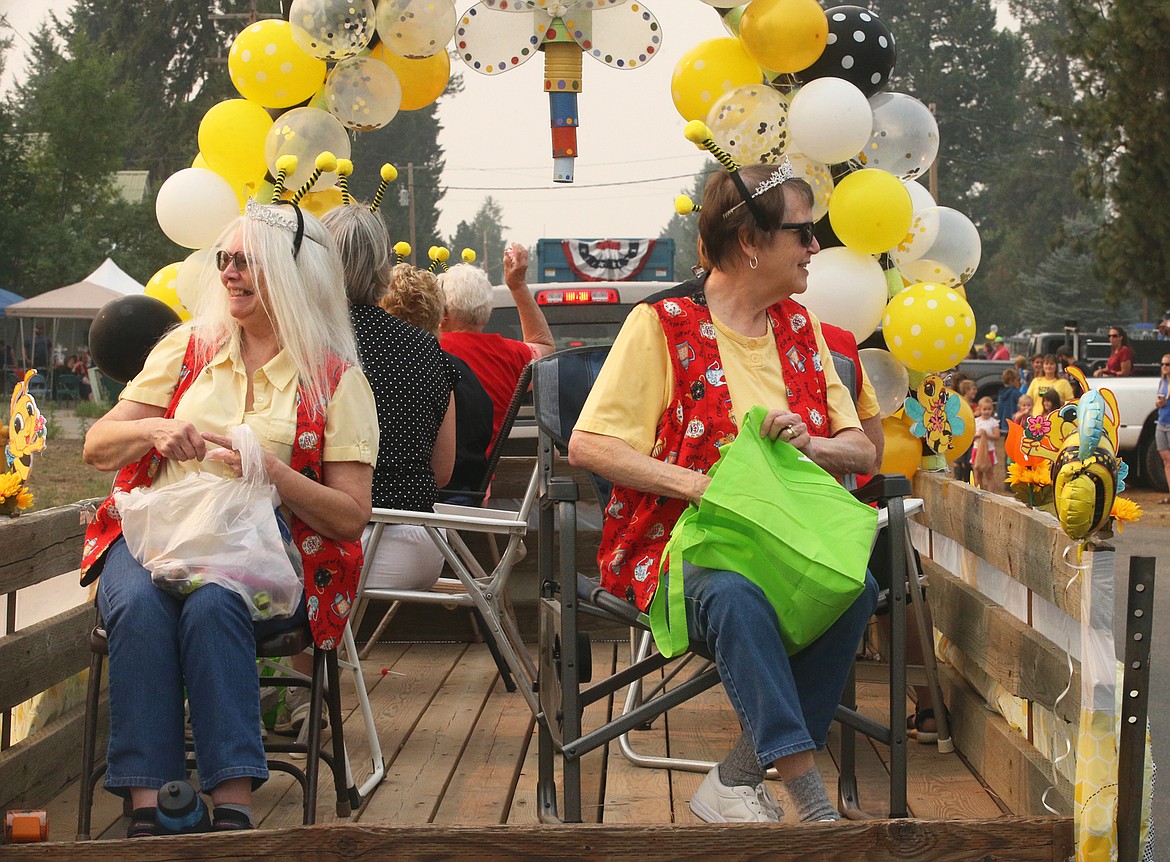 Jackie Wojnowski, right, and Jeri Groth with the Athol Grandmothers' Club enjoy Saturday's parade.