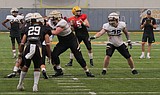 COLLEGE FOOTBALL: Vandals, Cougars hold scrimmages — of sorts