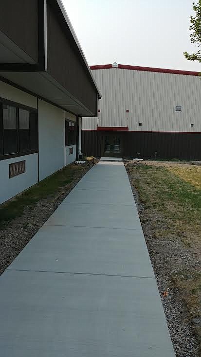 A walkway takes students, parents and educators to the new Plains School addition which was recently completed. It houses a new basketball court and a new arts space. (Chuck Bandel/Valley Press)