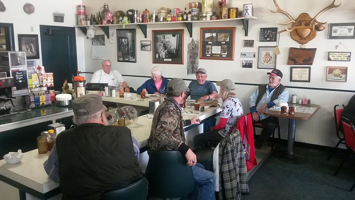 Earl Stanley enjoys a meal at the Libby Cafe with friends. (Photo courtesy of Karen Wickersham)