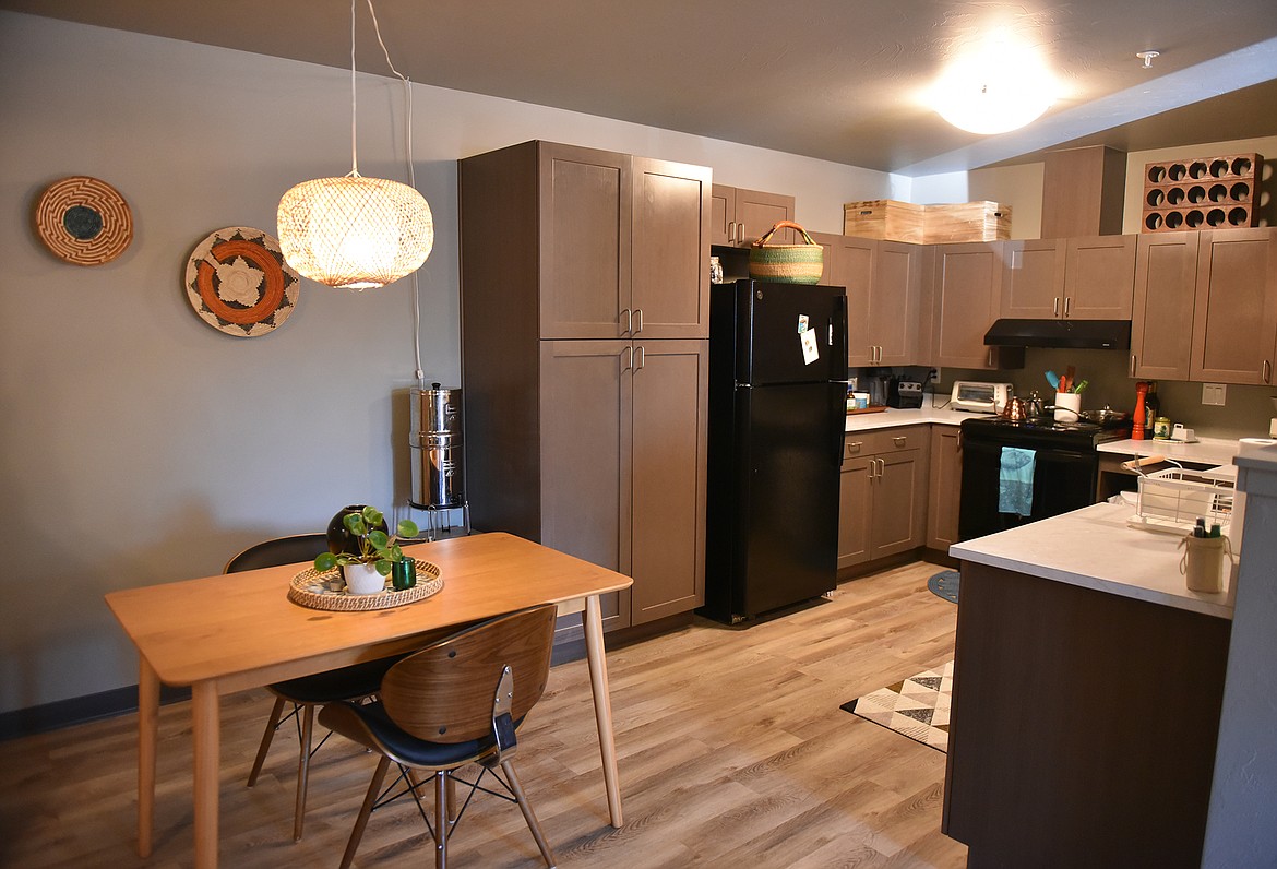 The kitchen and dining area inside one of the Alpenglow Apartments. (Heidi Desch/Whitefish Pilot)