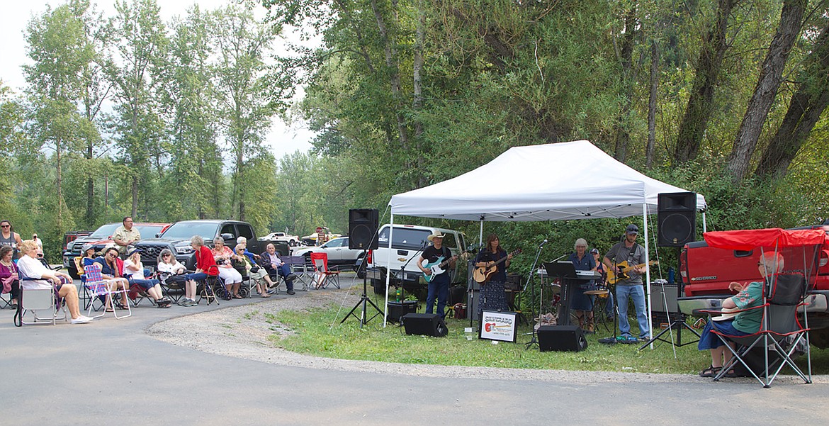 Local band Silverado provide music for the festivities. (Kay Bjork/For the Bigfork Eagle)