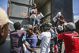 Haiti's troubled history may slow aid to earthquake victims