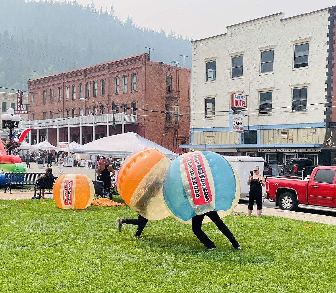 Inflatable suits and mid-air collisions were on the activity menu on the lawn of the Northern Pacific Railroad Depot Museum.