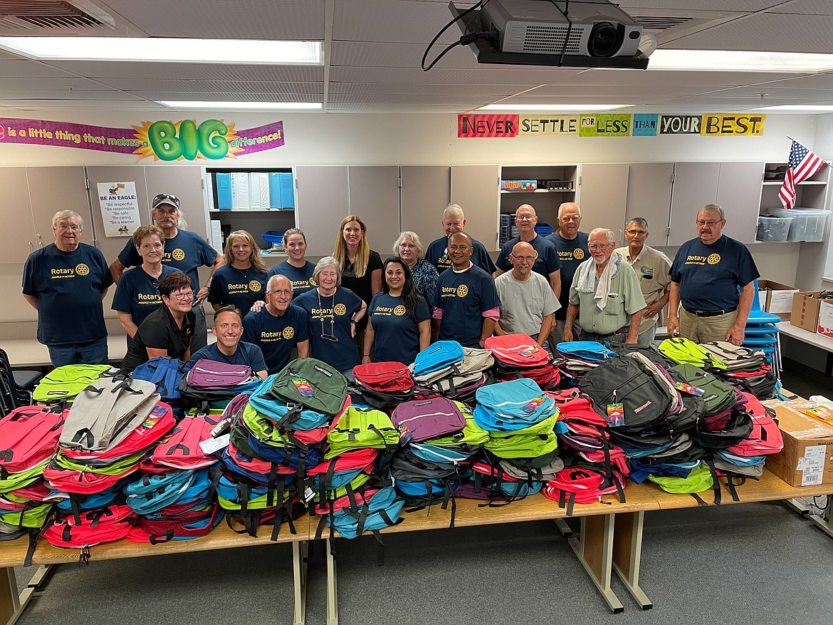 School supplies line the tables at Larson Heights Elementary School in Moses Lake for the Rotary Club of Moses Lake’s Backpacks 4 Kids event.