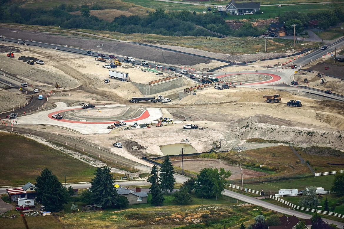 Two smaller roundabouts take shape as construction crews make progress at the U.S. 93 bypass and Foy's Lake Road interchange on Tuesday, Aug. 17, 2021. The state removed the roundabout connecting the U.S. 93 bypass and Foy's Lake Road, and replaced it with a highway overpass and two smaller roundabouts serving as on- and off-ramps to the bypass. The project was completed in November. (Casey Kreider/Daily Inter Lake file)