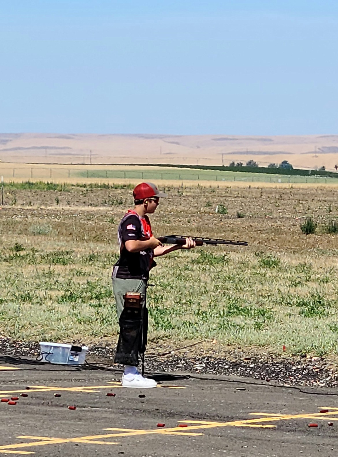 Travis Shearer waits for the target during a trapshooting competition in June.