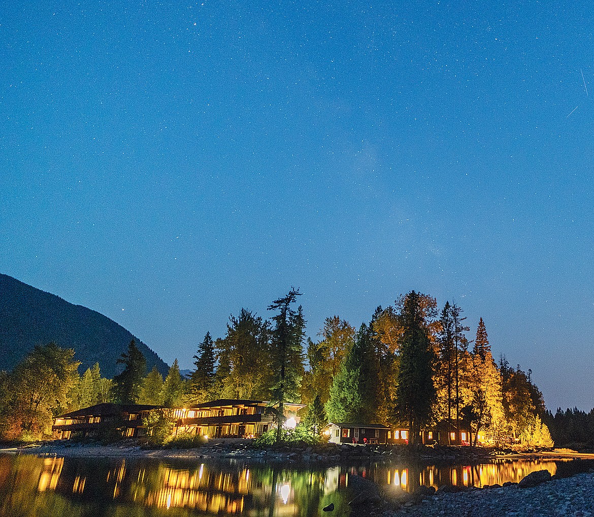 Stars shine over Apgar Village last week. While most lights are shielded in the village, some visitors had taken to stringing up lights of their own at rental cabins, causing the light pollution to the right.