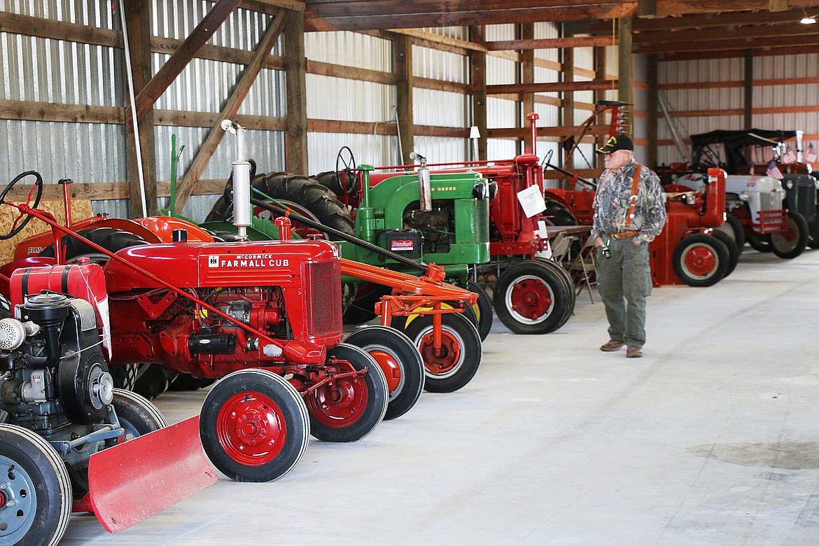 John Cripe looks at the tractors at the Bonner County Fair on Wednesday.