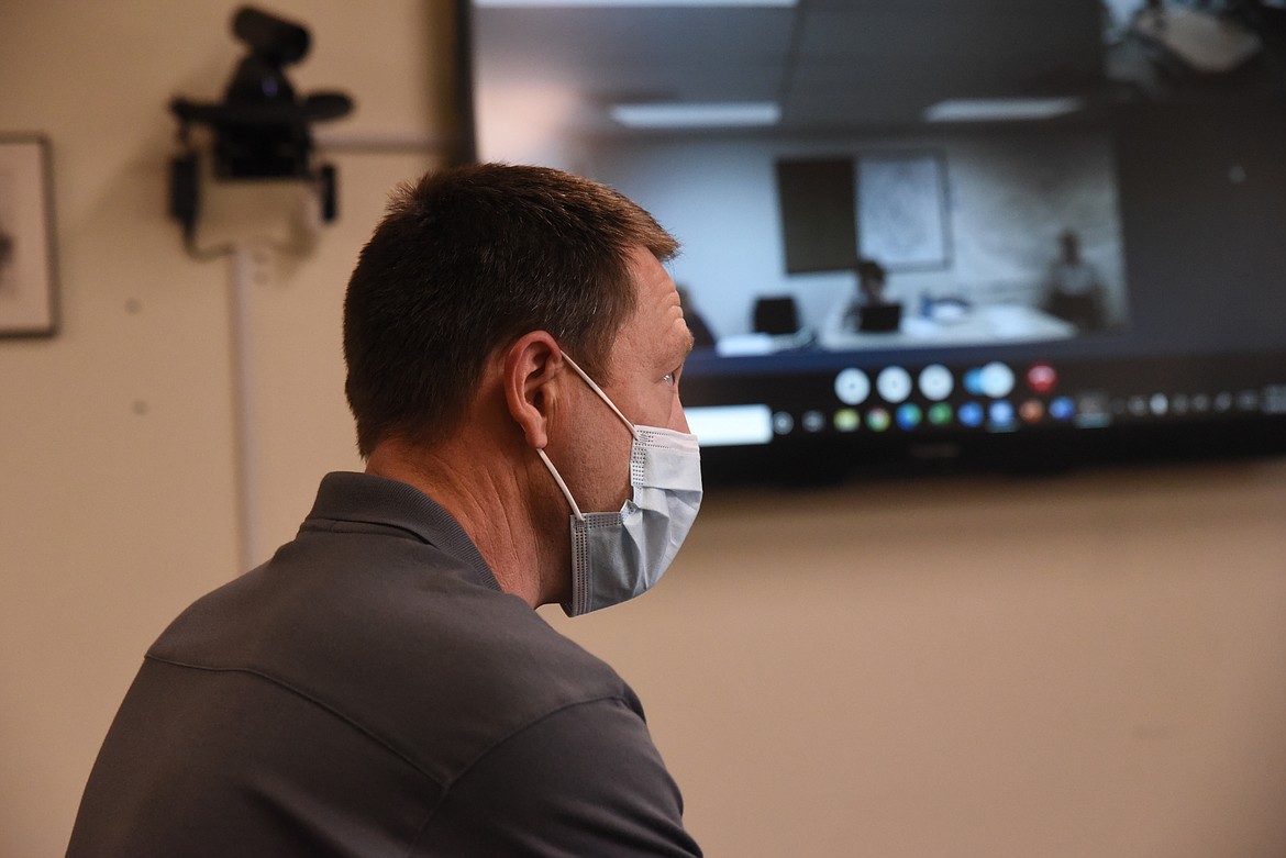 Chad Benson, superintendent of the Kootenai National Forest, speaks with the Lincoln County Board of Commissioners via videoconferencing software on Aug. 18. (Derrick Perkins/The Western News)