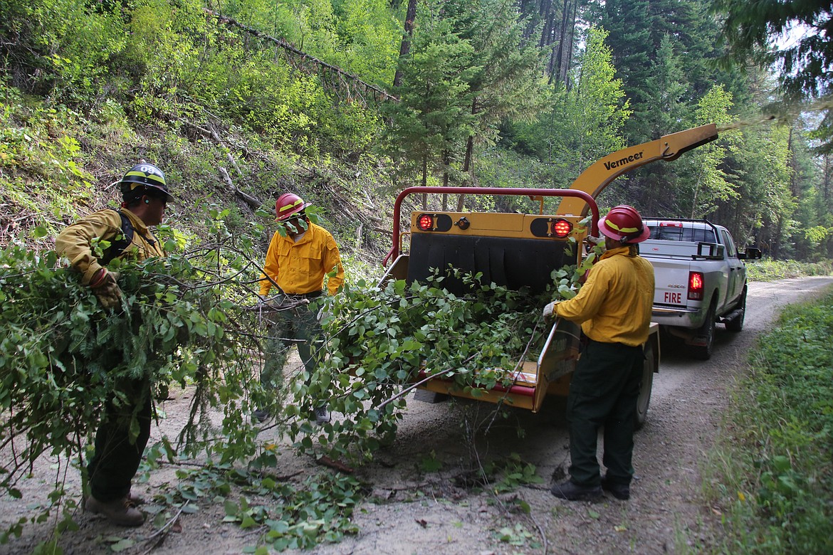 Crews chip fuels near the South Yaak Fire earlier this month. (Kootenai National Forest via InciWeb)