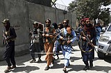 Taliban militants violently disperse rare Afghan protest