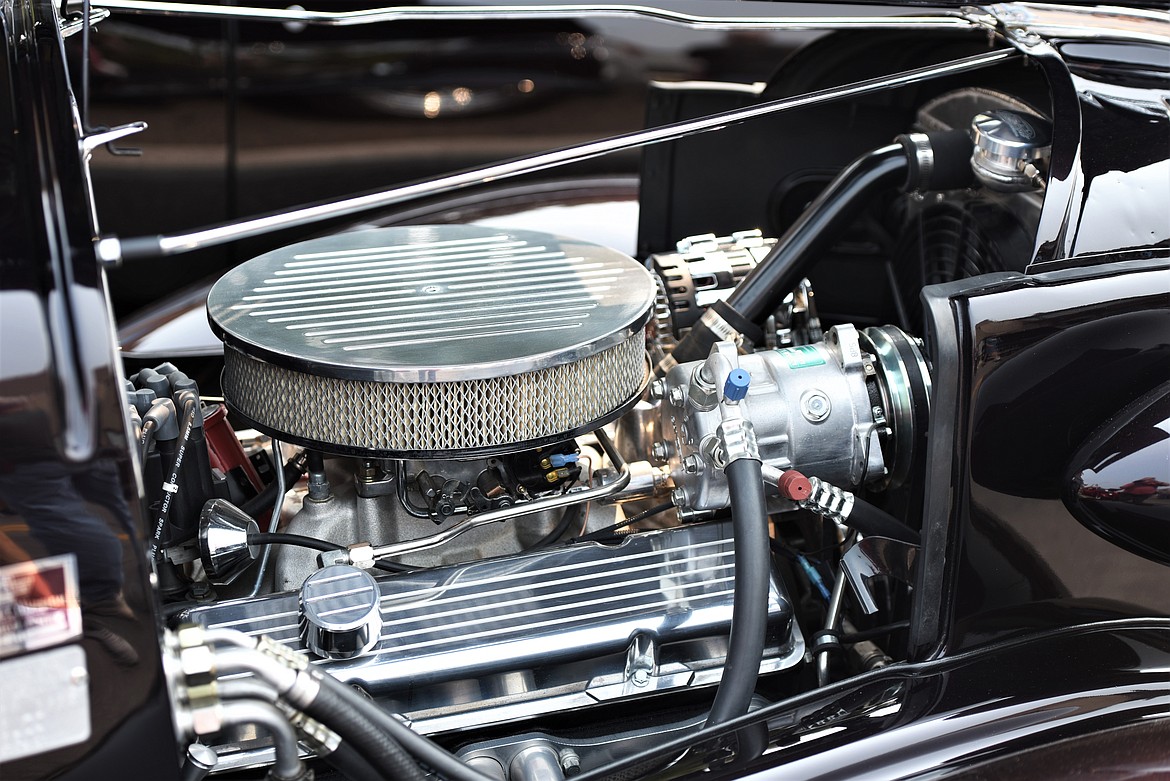 Bill Smith of Kalispell has the engine of his 1937 Chevy Coupe all chromed out. (Scot Heisel/Lake County Leader)