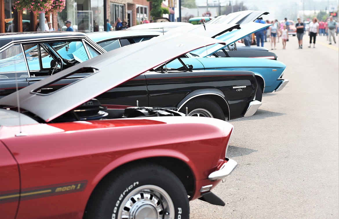 Muscle cars lined this stretch of Main Street during Saturday's car show. (Scot Heisel/Lake County Leader)
