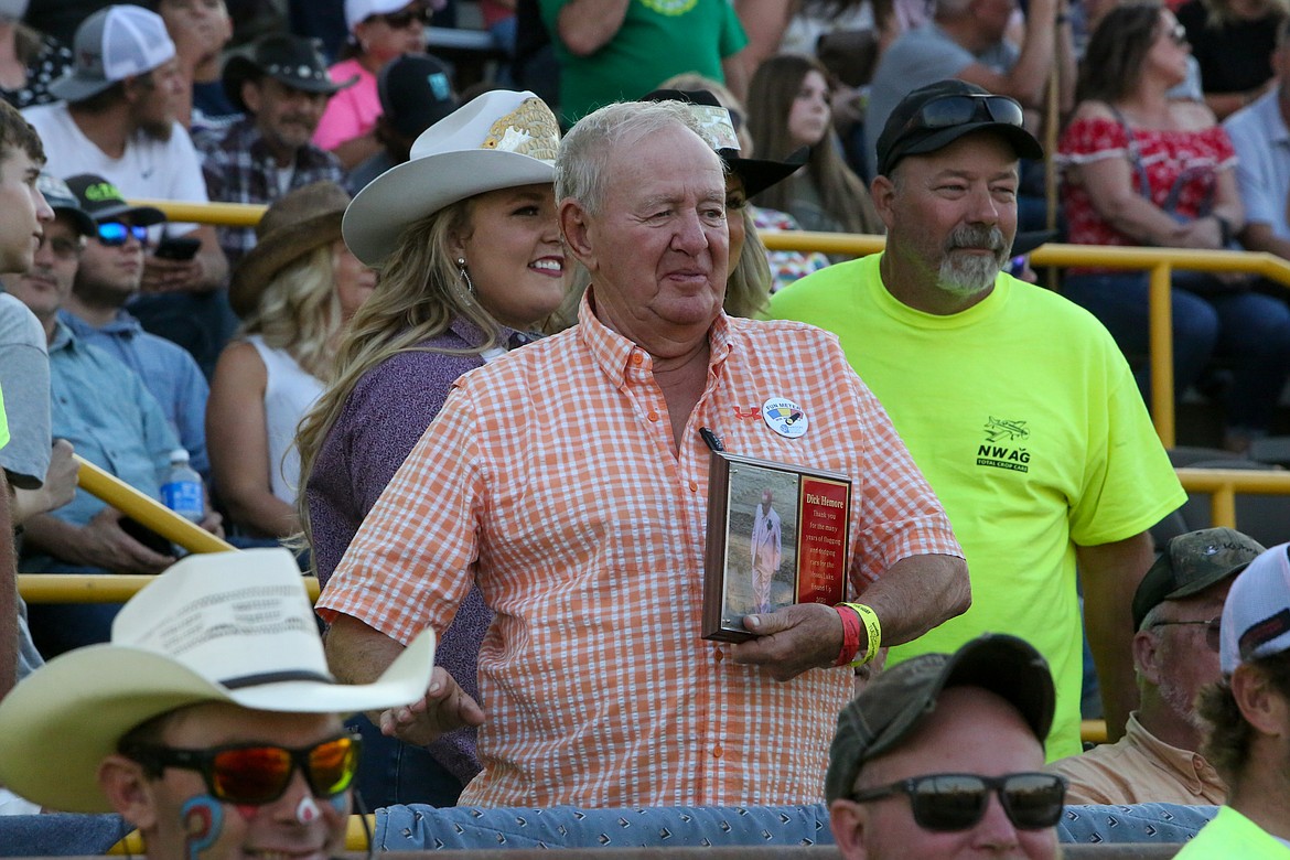 Dick Hemore, a longtime flagman for the Northwest Ag Demolition Derby, was honored with a plaque before events kicked off on Wednesday night.