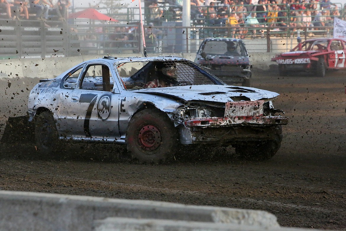 Cars line up to enter the arena on Wednesday at the Northwest Ag Demolition Derby.