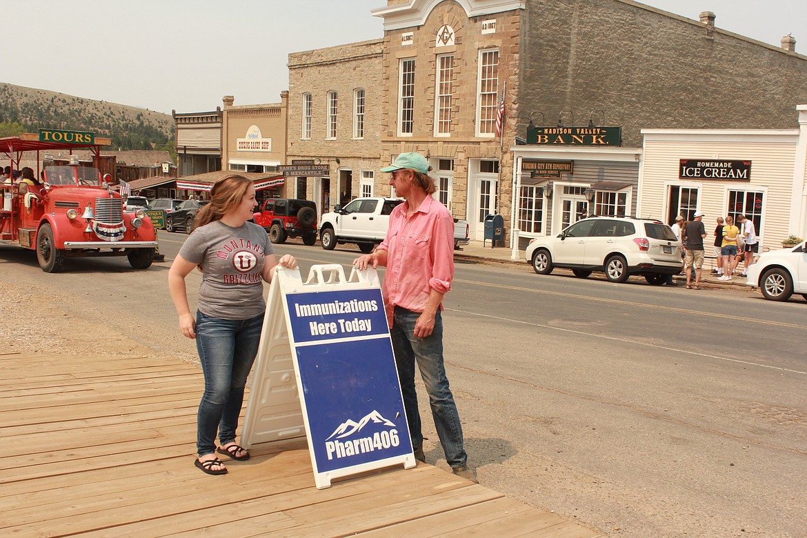 Madison County Health Director Emilie Sayler (left) and Virginia City Mayor Justin Gatewood asked for a traveling pharmacist to come to the town of 120. Virginia City teens otherwise would have had to drive at least 100 miles round trip to get a COVID-19 vaccine. (Katheryn Houghton/KHN)