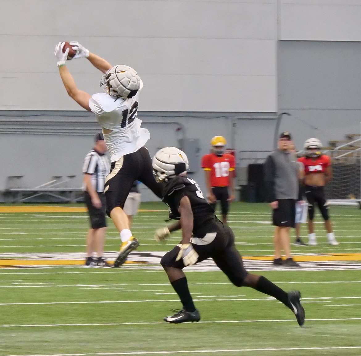 Photo courtesy Idaho Athletics
Connor Whitney (12) snags a pass during the Idaho Vandals' football scrimmage Saturday at the Kibbie Dome in Moscow.