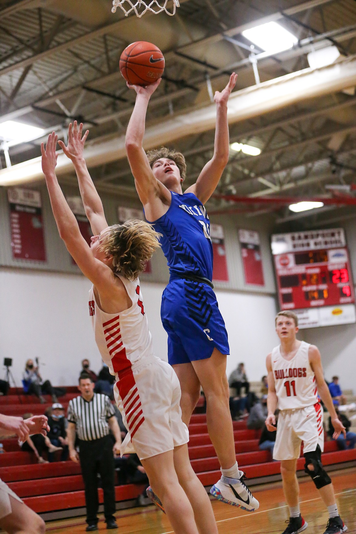 Photo by JASON DUCHOW PHOTOGRAPHY
4A Sandpoint and 5A Coeur d'Alene square off in boys basketball last winter at Sandpoint.