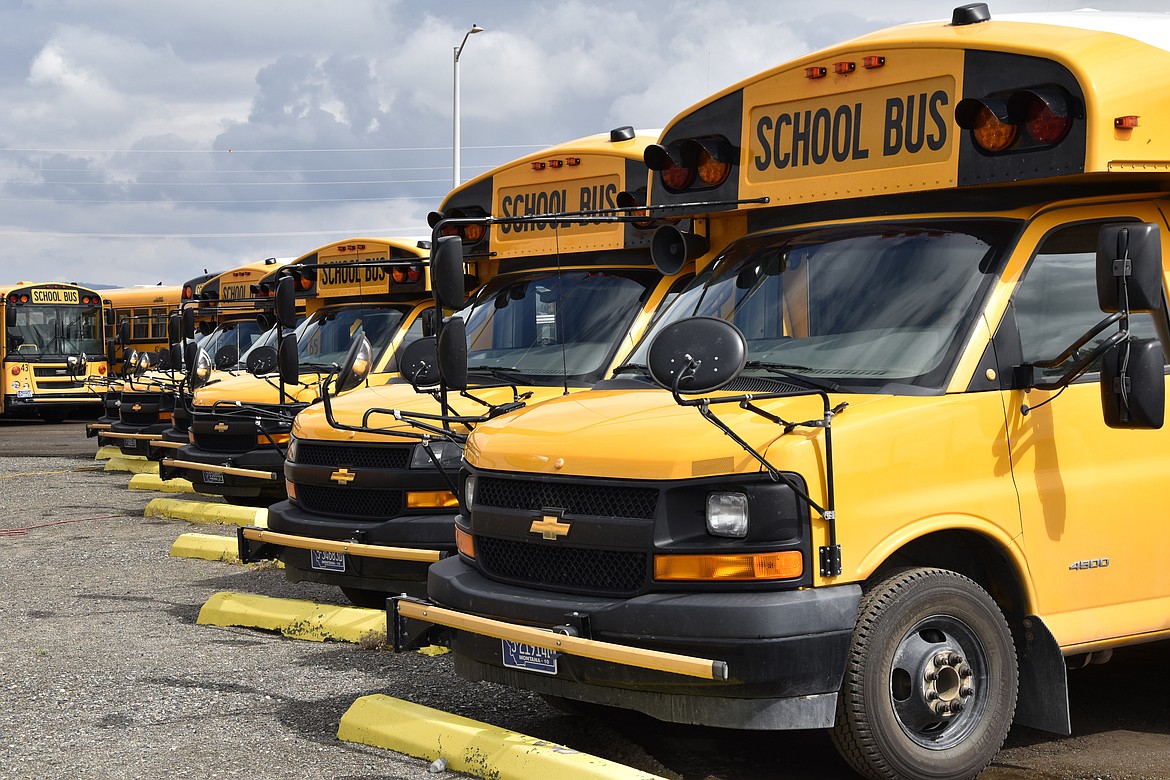 School buses were parked in Helena ahead of the beginning of the school year on Friday, Aug. 20, 2021. School districts across the country are coping with a shortage of bus drivers, a dilemma that comes even as they struggle to start a new school year during a new surge of the coronavirus pandemic. (Iris Samuels/Associated Press)